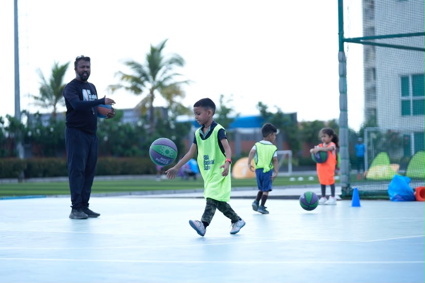 Certified coach mentoring players